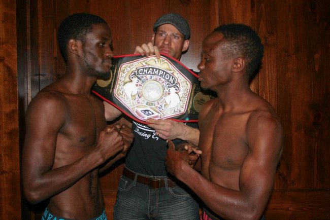 Anthony Napunyi(Right) during their weigh in for the Mid American feather weight title bout against Ismael Muwendo(left).(Photo:Courtesy)
