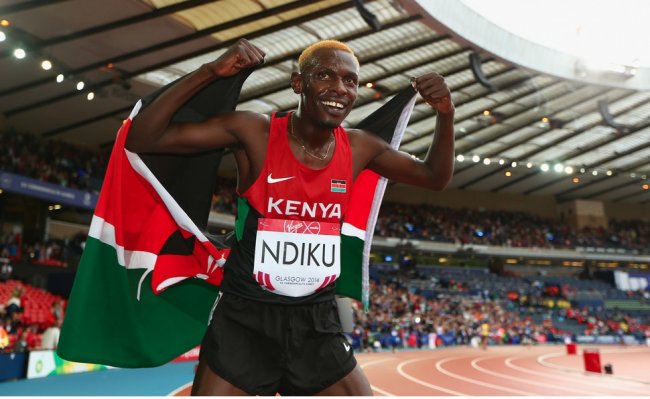 Caleb Ndiku celibates his 5000m win at the Hampden park stadium in Glasgow.