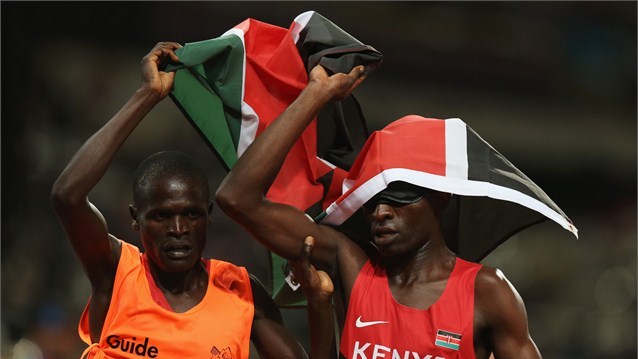 Samuel Muchai with his guide after winning gold in London in a World Record time.(Photo:SNA File)