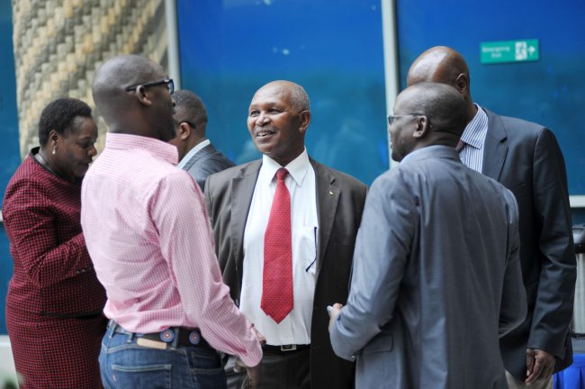 NOCK chairman Kipchoge Keino chats to delegates after the elections were stopped by the High Court. (Photo by Shutterspeed)