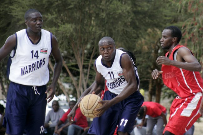 Eric Mutoro of Ulinzi navigates his way against Lions' Harrison Kaudia. He scored 14 points. (Photo by Shutterspeed)