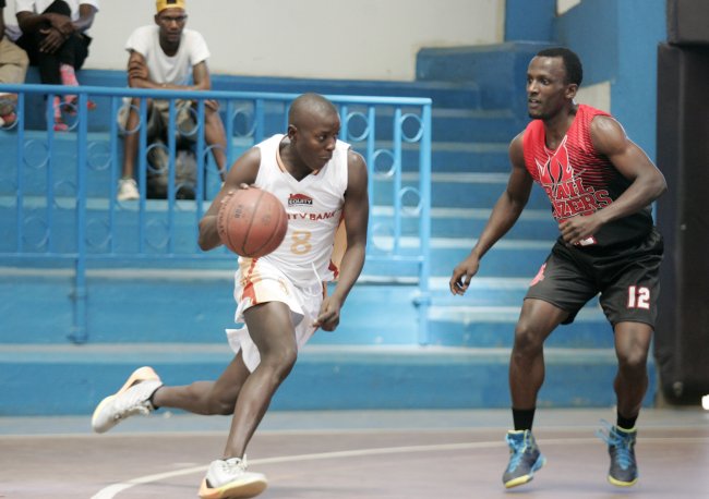 Alex Lugasi of Equity Bank dribbles past an opponent from Lions in a previous match. 9SNA. File Photo)