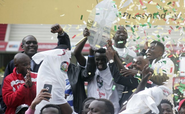 AFC Leopards captain Duncan Otieno lifts the GOtv Shield after they beat Kariobangi Sharks 2-0 in the final at Kasarani Stadium on Friday. (Photo by Shutterspeed)