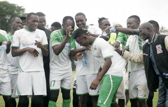 Gor Mahia striker George Odhiambo is congratulated by teammates. (Photo by Shutterspeed)