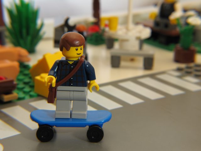 Why lego men have holes in their heads?